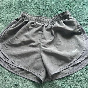Small Nike dry fit grey shorts, never worn!